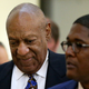 Cosby with his spokesman, Andrew Wyatt